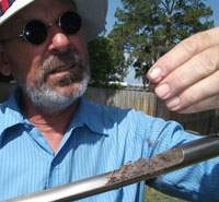 Rick Orr examining a soil sample in Pinellas County